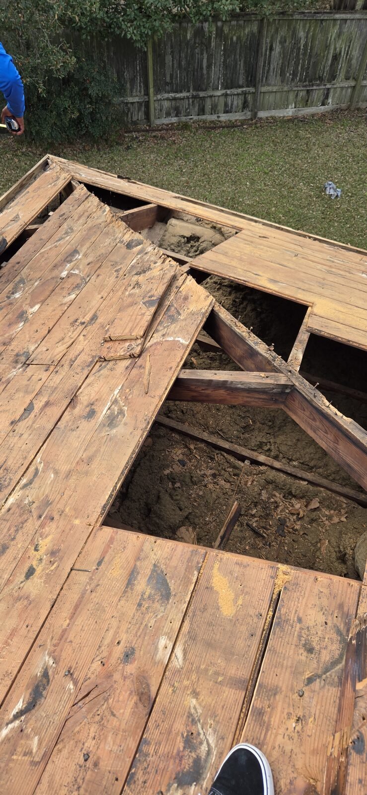Rotted roof decking exposed during tear-off
