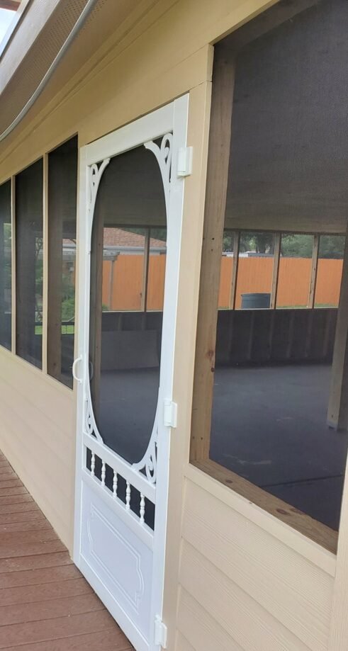Screened porch with fresh exterior paint and new screens